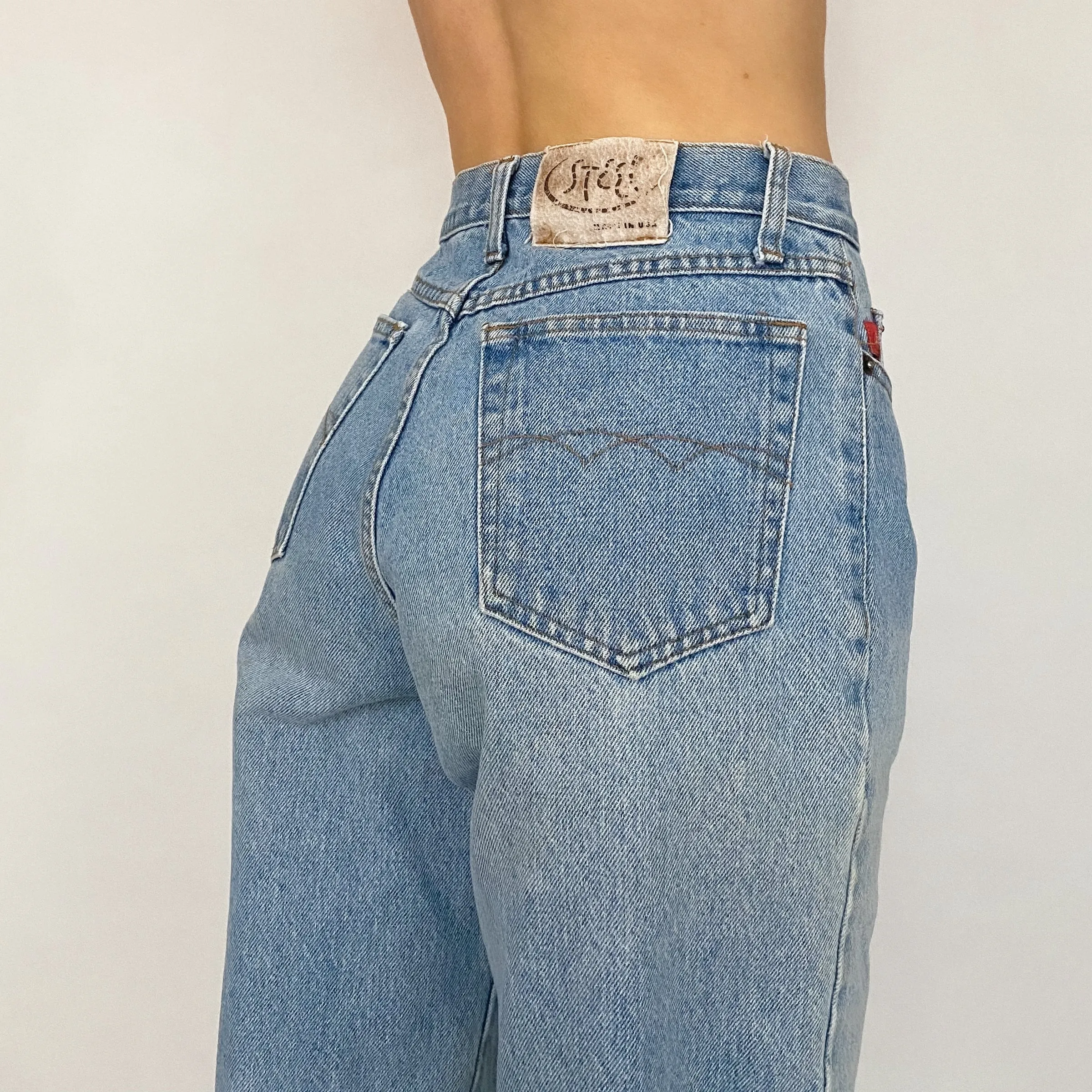 vintage high rise light wash jeans - size 26